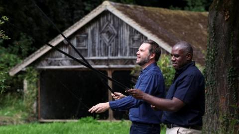 Lammy and Vance with fishing rods