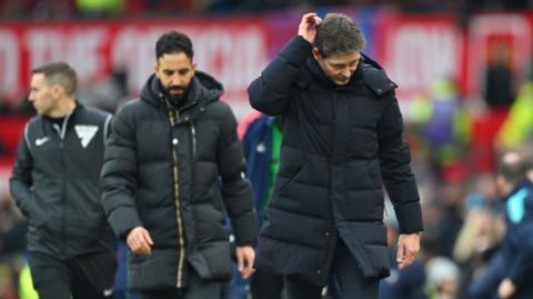 Manchester United head coach Ruben Amorim following Crystal Palace manager Oliver Glasner down the touchline at Old Trafford