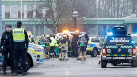 Members of the emergengy services work at the scene of the Risbergska School in Orebro, Sweden, on February 4, 2025, following reports of a serious violent crime.