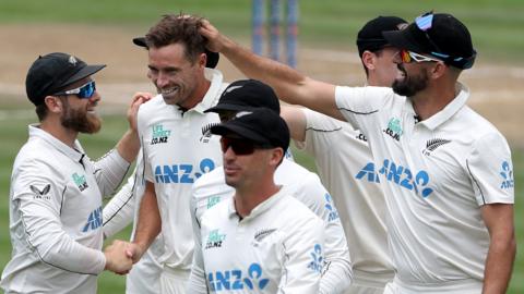 New Zealand players celebrate a wicket