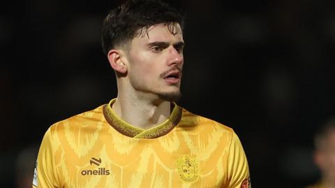Edon Pruti in action for Sutton United