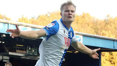 Blackburn Rovers' Andri Gudjohnsen wheels away in celebration after scoring his side's second goal 
