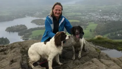 Picture of a woman on a mountain