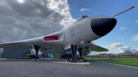 Avro Vulcan aircraft parked outside museum