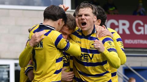 Torquay celebrate a goal
