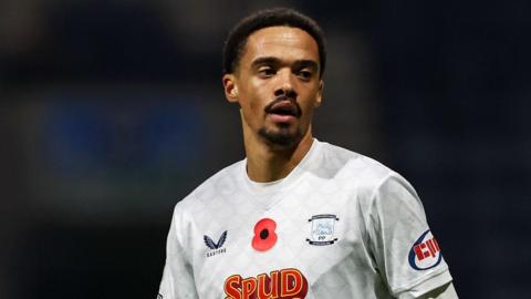 Jamal Lewis looks on while in action for Preston North End