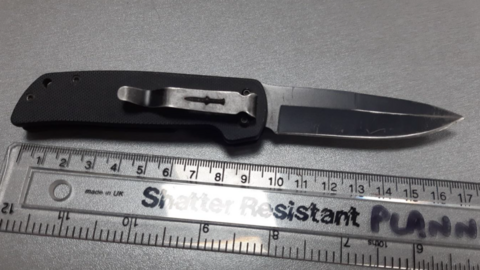 Pocket knife measuring 17cm next to a ruler for comparison