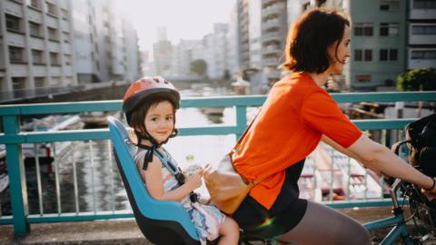 Woman and child cycling