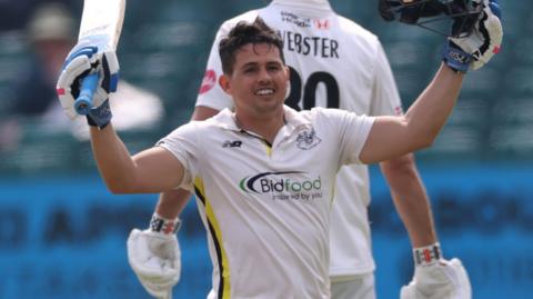 Graeme van Buuren celebrates scoring a century