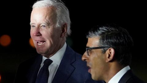 British Prime Minister Rishi Sunak greets U.S. President Joe Biden