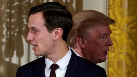 U.S. President Donald Trump passes his adviser and son-in-law Jared Kushner