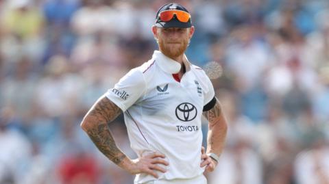 England captain Ben Stokes stands with his hands on his hips