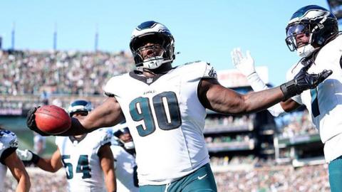 Jordan Davis returns a blocked kick for a touchdown for the Philadelphia Eagles against the Los Angeles Rams