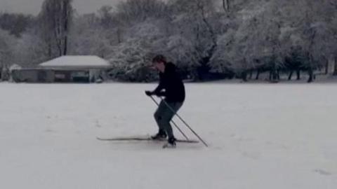 Man skiing in park