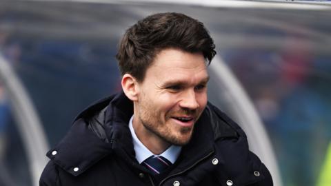 Danny Rohl smiles on the touchline before Rangers' Scottish Cup tie against Queen's Park