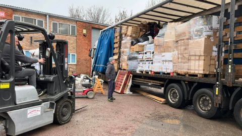 A lorry being unloaded