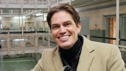 David De Min inside the former immigration centre which more recently has been a film set for Marvel's latest film. 
