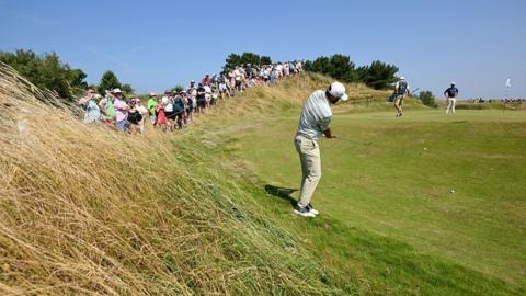 Scottie Scheffler playing a practice shot at Royal Birkdale