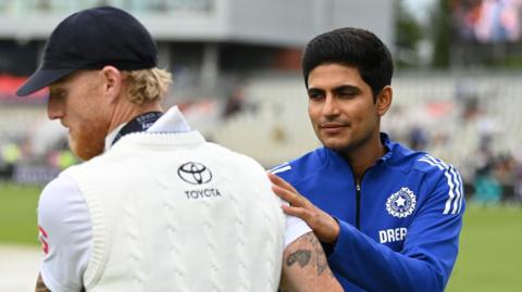 Shubman Gill shakes hands with Ben Stokes