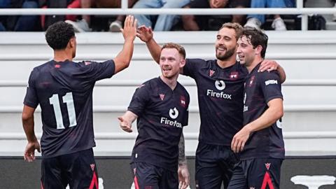 Wrexham's Sam Smith (third right) celebrates)