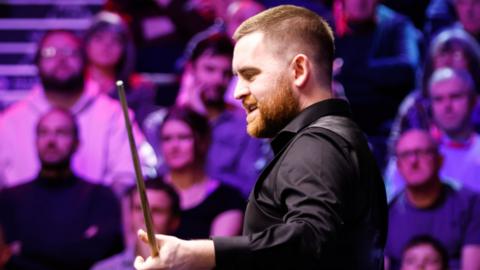  Jak Jones of Wales reacts in the first round match against Luca Brecel of Belgium on day 3 of the 2024 UK Championship