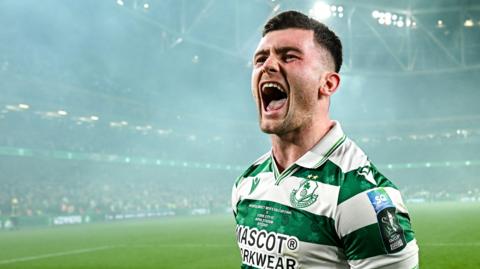 Josh Honohan celebrates winning the FAI Cup with Shamrock Rovers