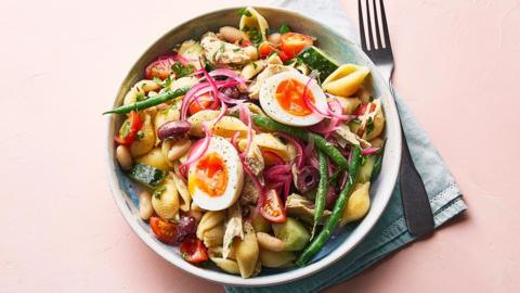 A bowl of Mackerel pasta salad Niçoise-style.