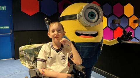 Photograph of 13 year-old Elliot from Bury. He is pictured in the MediCinema at Manchester Royal Infirmary.