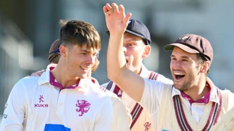 Archie Vaughan of Somerset celebrates a wicket