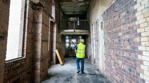 Thousands of tonnes of debris have been removed from the shell of the iconic Mackintosh Building.