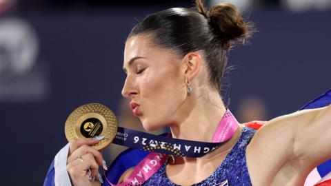 Gold medalist Amy Hunt of Team Great Britain poses for a photo after victory in Women's 200 Metres