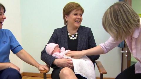 Baby Grace is sick on Nicola Sturgeon