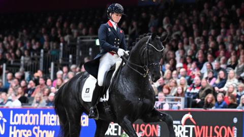 Lottie Fry and Glamourdale competing at the London International Horse Show in 2024