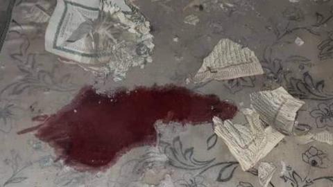 Photograph posted online by Mareb Press website a bloodstained carpet at a religious school and mosque reportedly hit by a Houthi ballistic missile in al-Jawba district, Marib province, Yemen (1 November 2021)