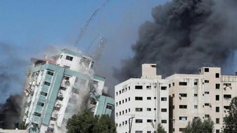 Gaza tower block collapsing