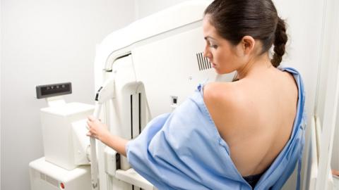 Woman having a mammogram