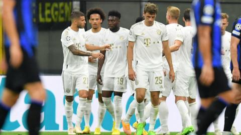 Bayern Munich's players celebrate scoring against Inter Milan in the Champions League