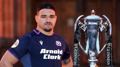 Sione Tuipulotu poses for photographs with the Six Nations trophy during the 2026 Guinness Men's Six Nations Launch Event at Edinburgh Castle