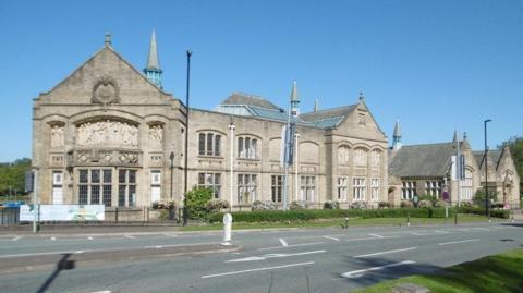 Exterior of the Victorian Touchstones building on the junction