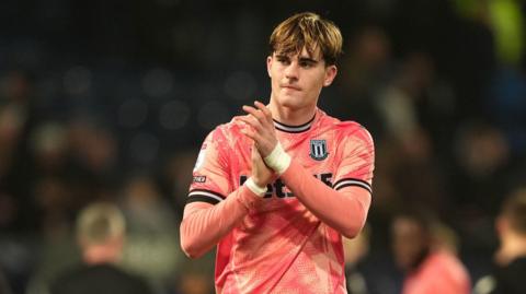 Nathan Lowe applauds the Stoke City fans after the Potters' 1-1 draw with West Bromwich Albion at The Hawthorns