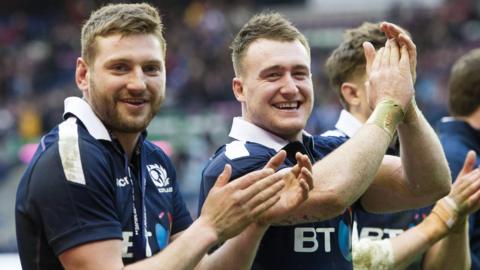 Finn Russell and Stuart Hogg celebrate Scotland's win over Wales in 2017