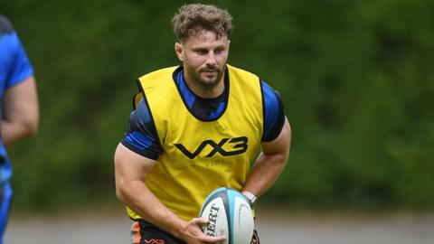 Dragons flanker Thomas Young carries the ball in training