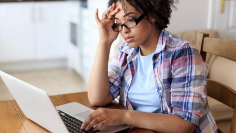 Woman using online banking