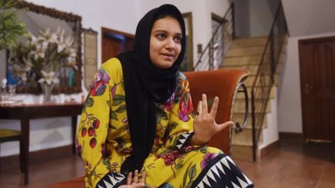 Khadeeja Siddiqui, 23, a Pakistani law student who was stabbed 23 times by a classmate after she had rejected him romantically, speaks during an interview with AFP in Lahore