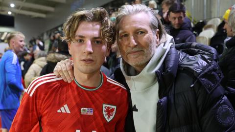 Charlie Savage of Wales with his father Robbie after Wales U21s v Iceland U21s