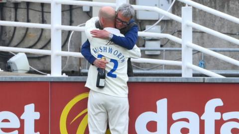 Chris Rushworth is congratulated by his father