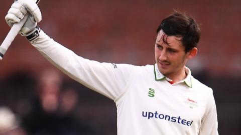 Harry Swindells celebrates his century against Somerset