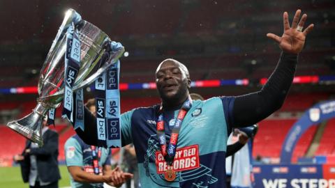 Adebayo Akinfenwa celebrates promotion