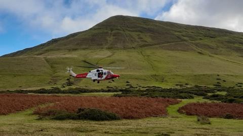 A Coastguard helicopter at Hay Bluff