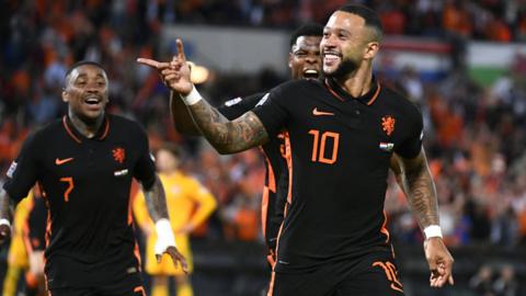 Netherlands' Memphis Depay celebrates scoring the winner against Wales